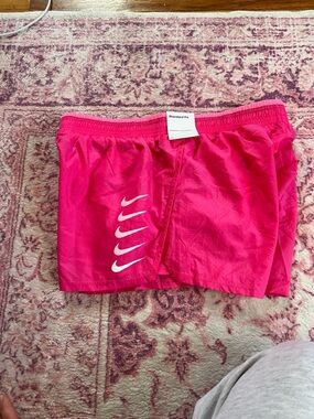 Nike Hot Pink Running Shorts with White Tag Detail
